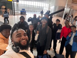 NSBE students pose for a photo in the airport before the trip to Atlanta for the convention.