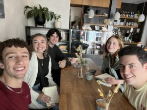 Students around a table in a cafe